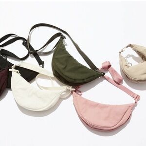 NWOT Uniqlo round ultra mini bag